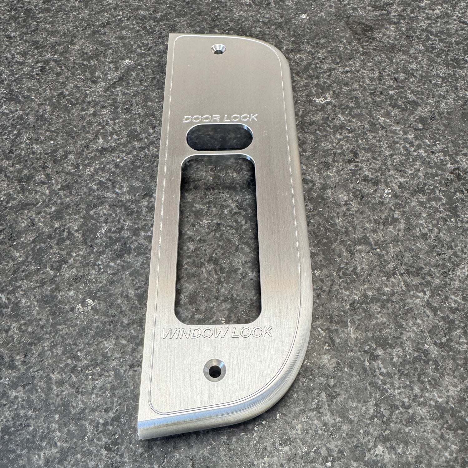 Billet aluminum window switch bezel for OBS Ford 4 door trucks. Brushed finish. Protective coating. Option: No mirror control