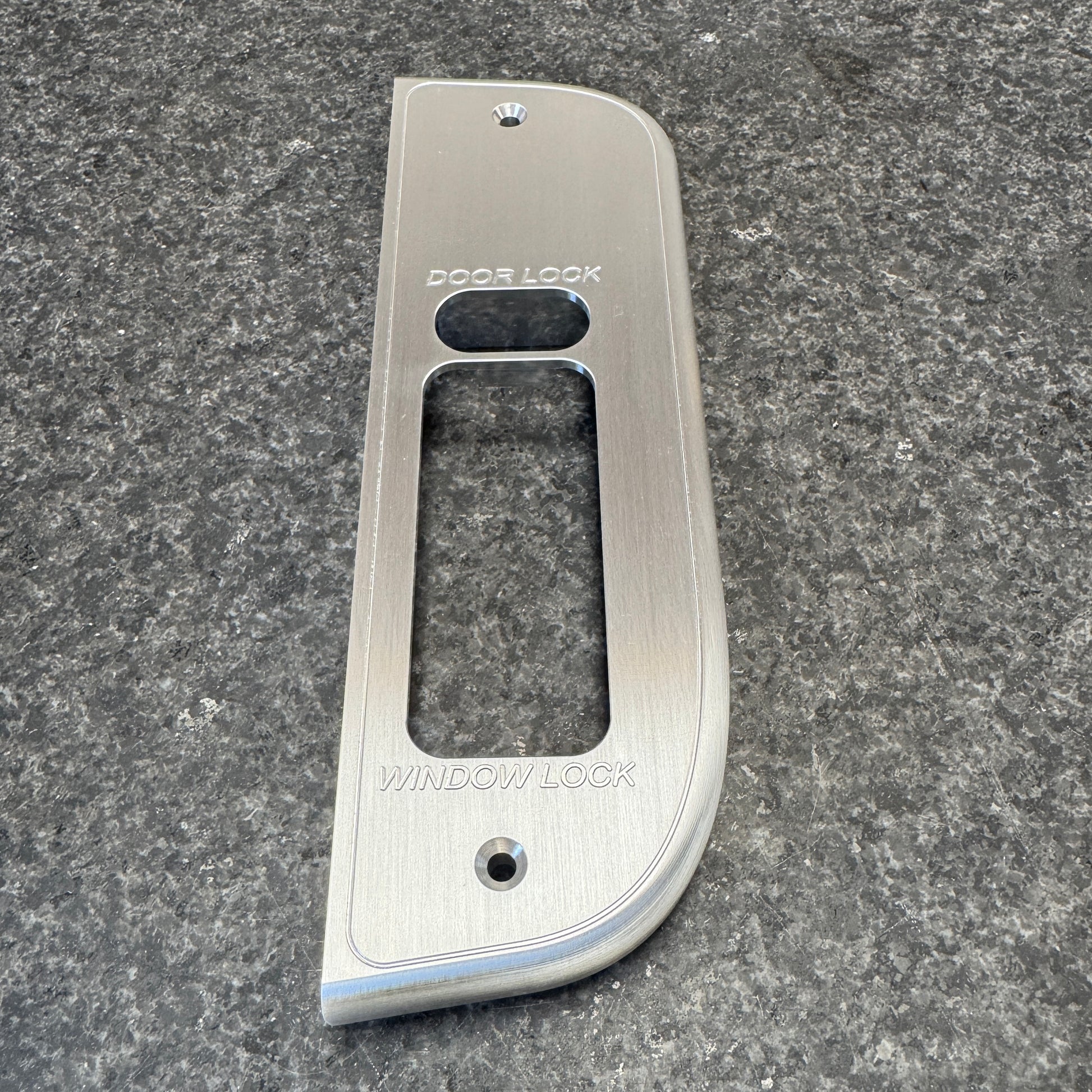 Billet aluminum window switch bezel for OBS Ford 4 door trucks. Brushed finish. Protective coating. Option: No mirror control